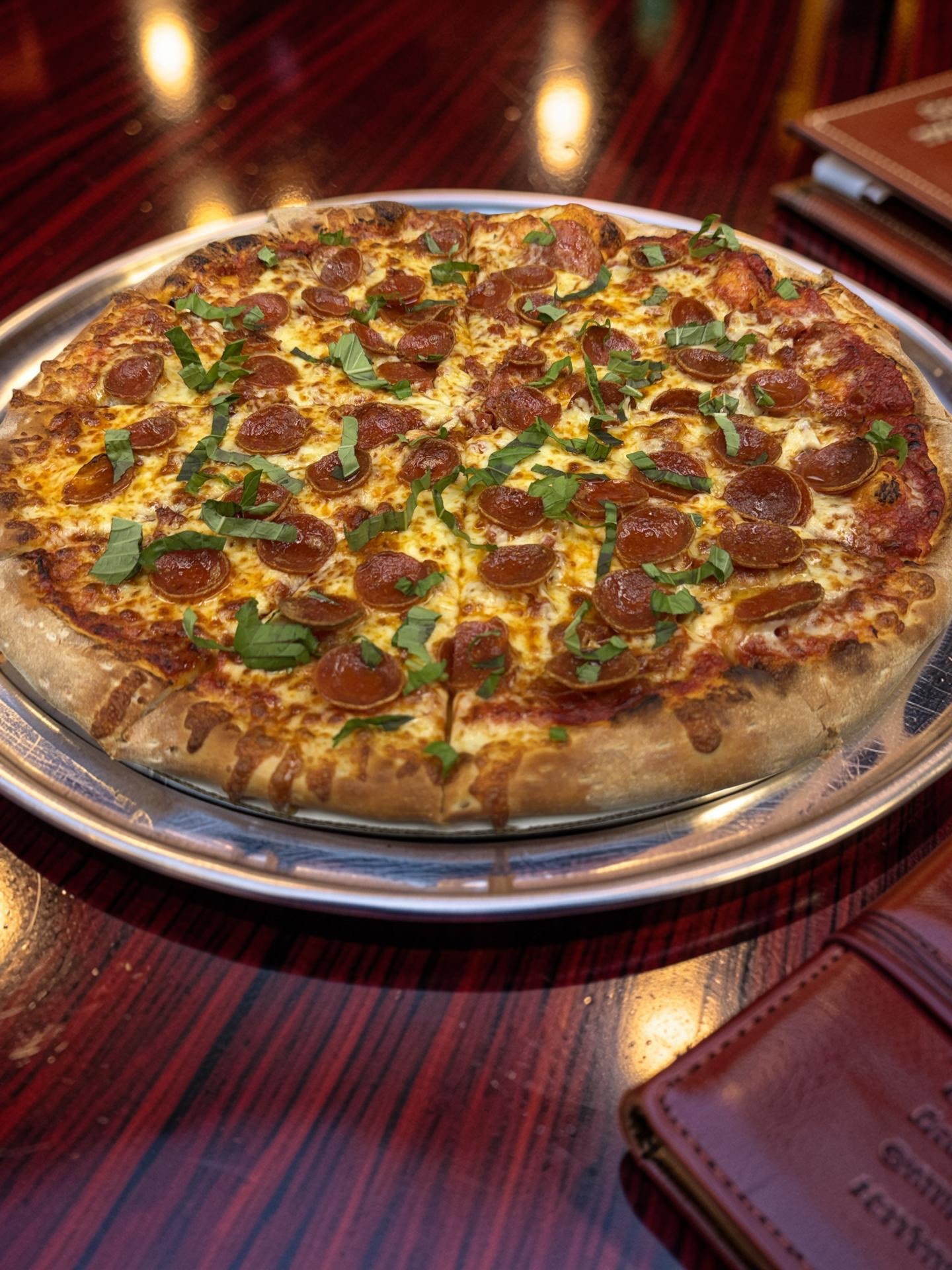 The Trifecta pizza — three pepperoni styles, Gorgonzola, Asiago, and hot honey